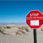 A sign board in Desert showing extreme heat danger