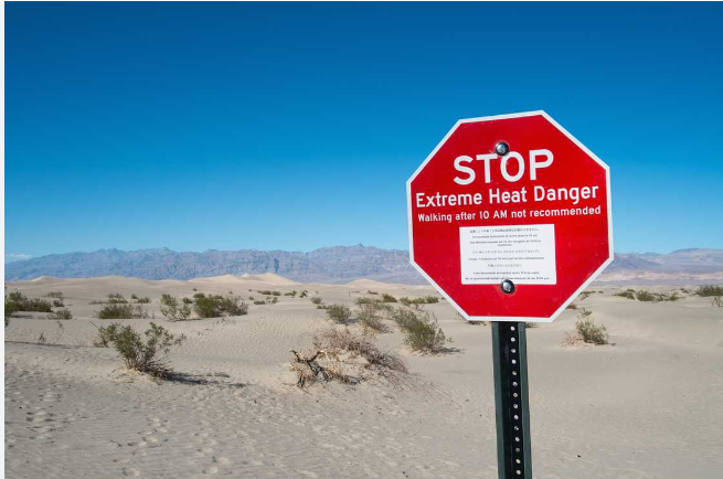 A sign board in Desert showing extreme heat danger