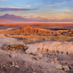 A beautifull sunset scene in Atacama desert, clear sky with some clouds