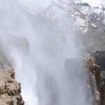 reverse waterfall near edge of mountain